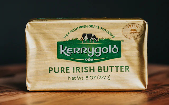 Block of butter on a wooden table